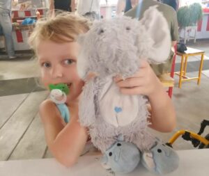 Lotta with her plush elephant
