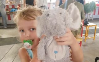 Lotta with her plush elephant